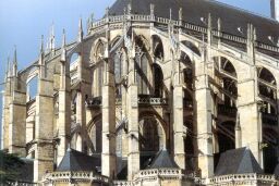 Choir of Cathedral du Mans showing glass curtain choir walls with supporting flying buttresses, c 1200